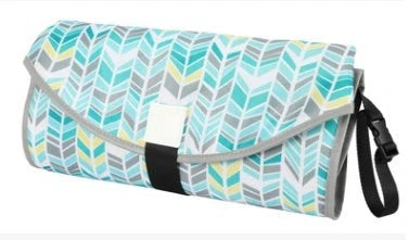 Portable and Waterproof Baby Changing Pad in various color designs, featuring a compact folded size and generous expanded size for comfortable diaper changes