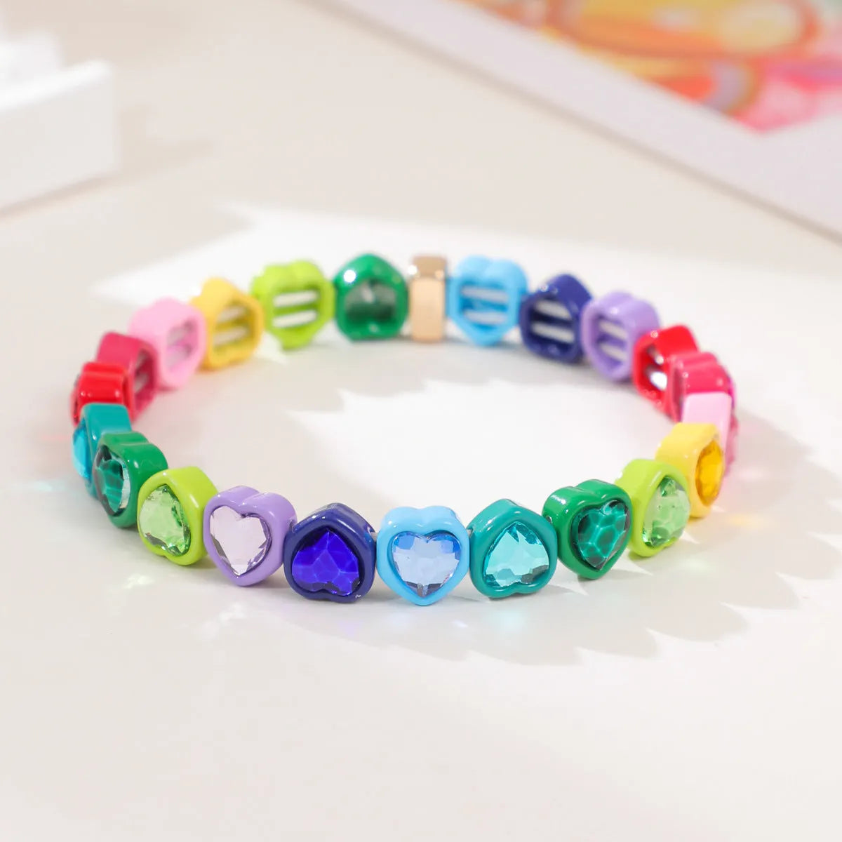 Rainbow enamel heart-shaped stretch bracelet in alloy with diamond process surface