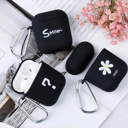 PC material AirPods earphone cover in black and pink with decorative flower and smiley face styles