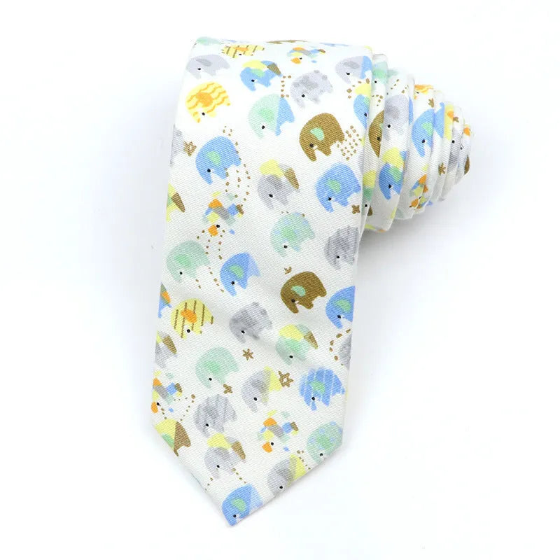 A narrow Korean-style cotton bow tie featuring a cartoon print, shown in a selection of colours.