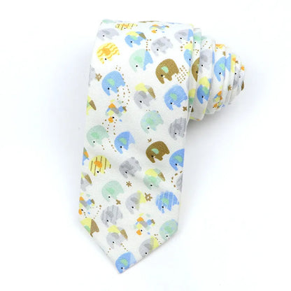 A narrow Korean-style cotton bow tie featuring a cartoon print, shown in a selection of colours.