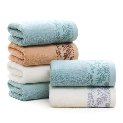 Wisteria flower jacquard cotton towel showing textured surface and 34x73 cm dimensions