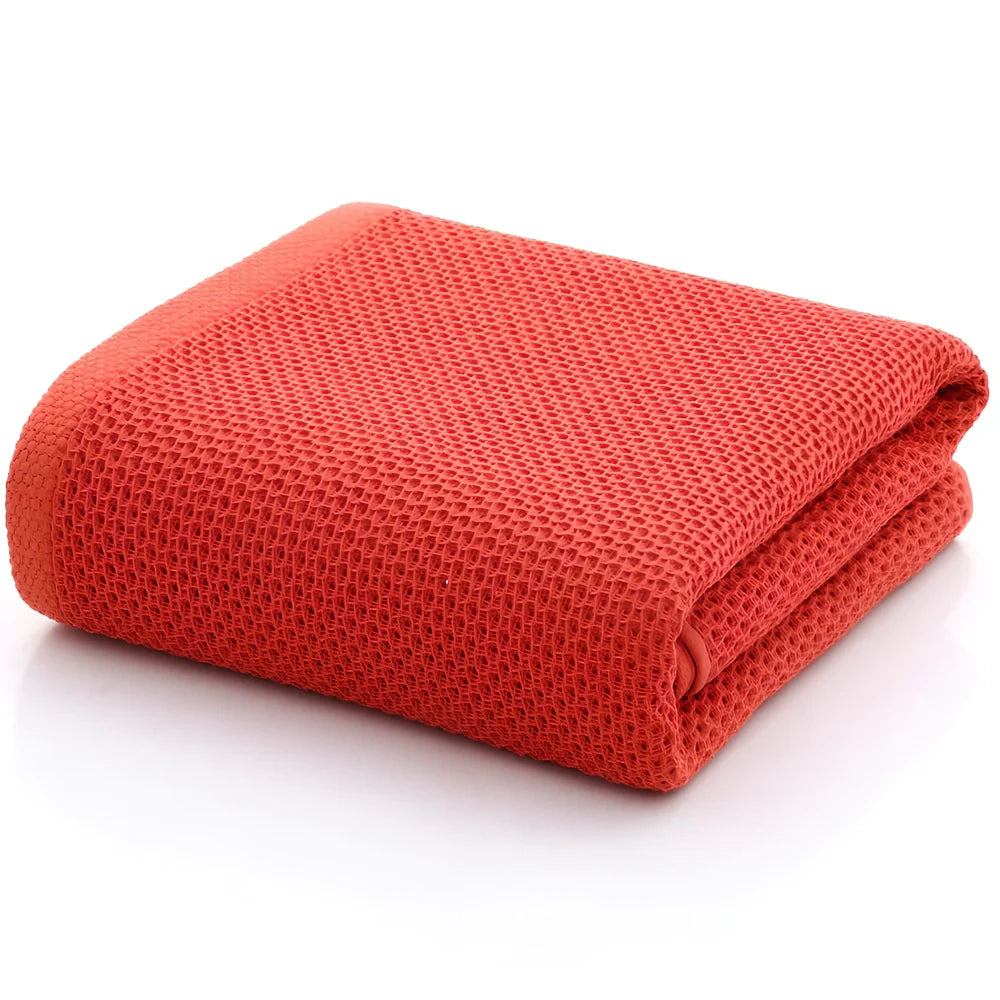 100% cotton honeycomb weave face towel in blue colour showing textured pattern and 70x140cm dimensions