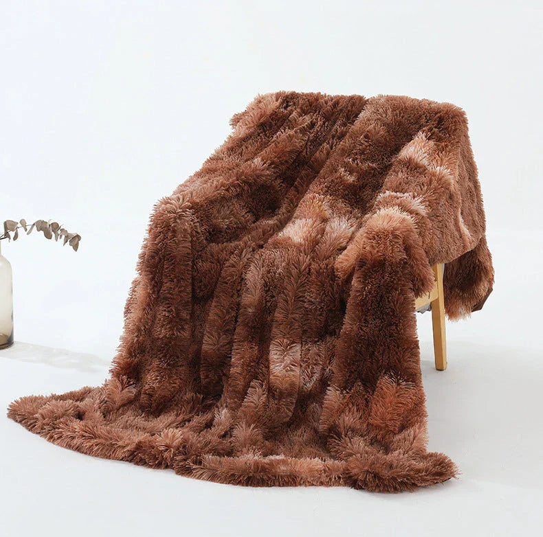Soft, plush sherpa throw blanket in a variety of colors and sizes, perfect for cozy relaxation on the sofa or bed
