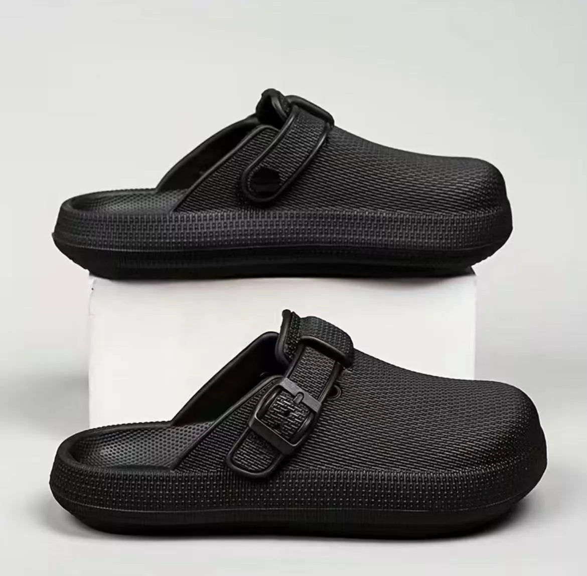 Lightweight EVA indoor home slippers in black, gray, and white