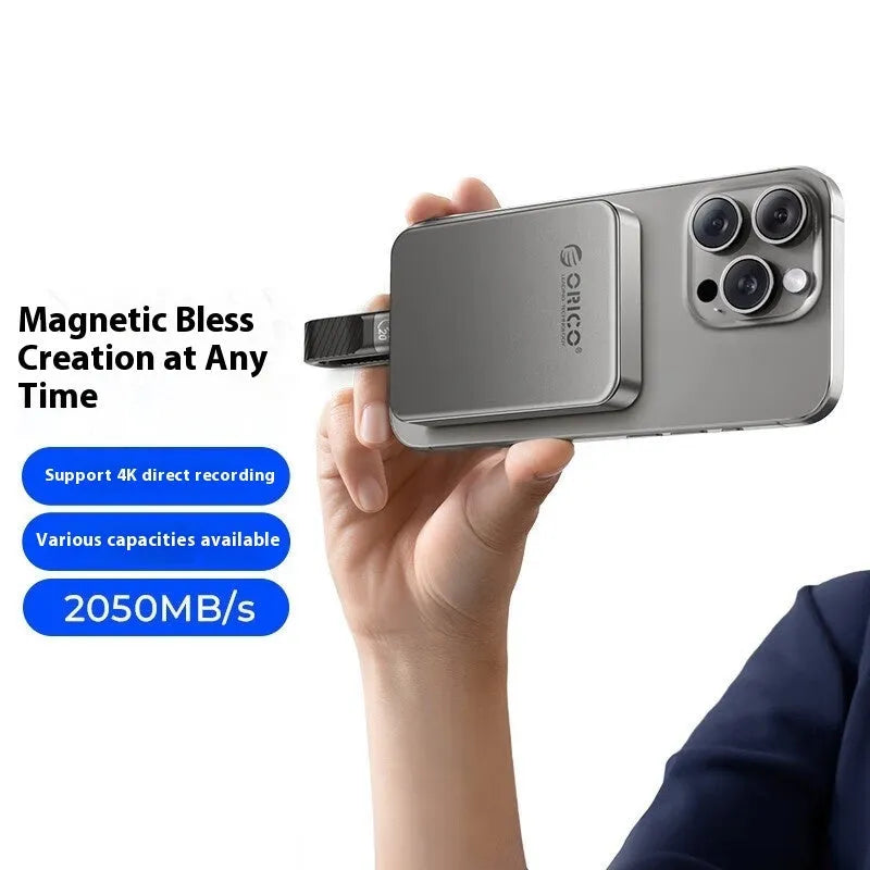 Grey magnetic mobile solid state drive with ultra-thin design and magnetic suction ring for phones and computers