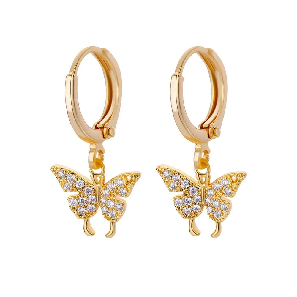 Women's irregular geometric butterfly earrings in copper with diamond treatment, showing heart-shaped and star designs in various colours