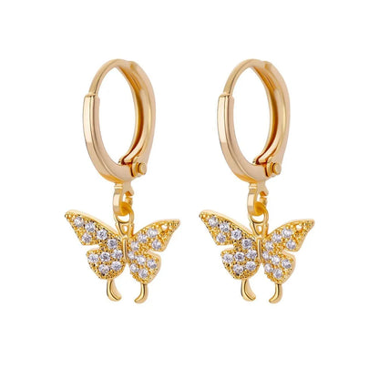 Women's irregular geometric butterfly earrings in copper with diamond treatment, showing heart-shaped and star designs in various colours