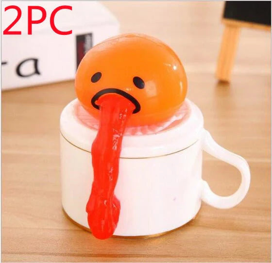 Gudetama Vomiting Egg Toy in green, orange, pink, and yellow for stress relief and fun