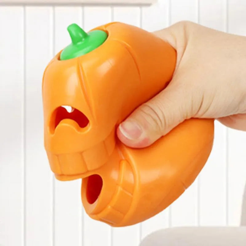 Yellow TPR pumpkin-shaped durable chew toy for aggressive dogs and teething puppies.