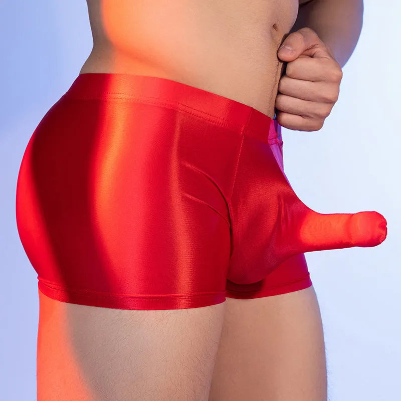 Men's red animal print seamless nylon boxer shorts laid flat, showing mid-waist band and seamless construction.