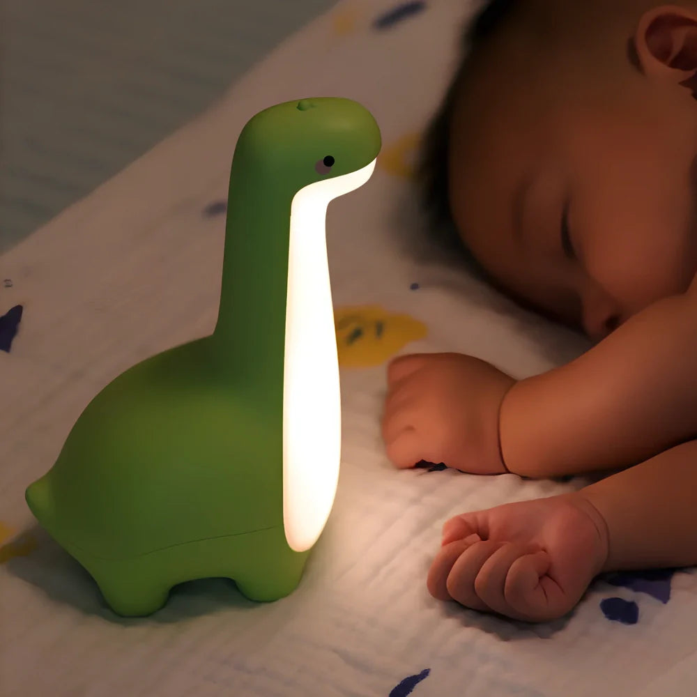 Dinosaur-shaped children's night light in lemon yellow with USB charging cable and 3000K warm white illumination