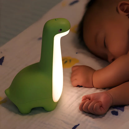 Dinosaur-shaped children's night light in lemon yellow with USB charging cable and 3000K warm white illumination