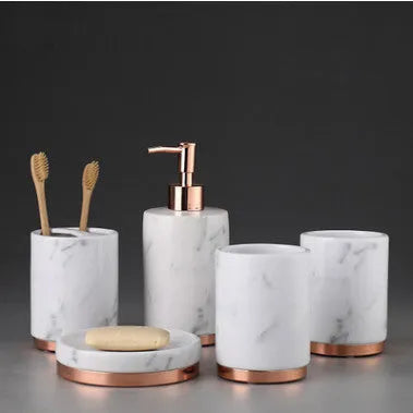 Ceramic bathroom set with bright glaze showing emulsion bottle, cup, toothbrush holder and soap dish