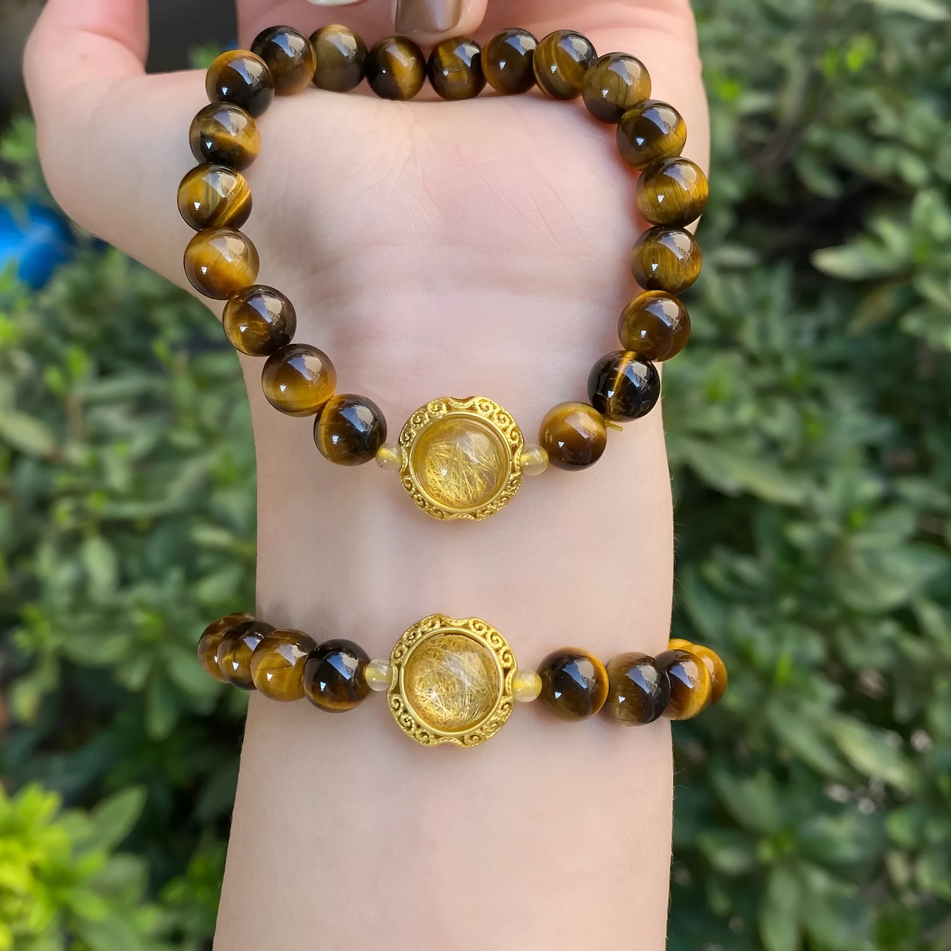 Handmade crystal bracelet with diamond gourd, disc, and prayer wheel beads in 8mm and 10mm sizes.