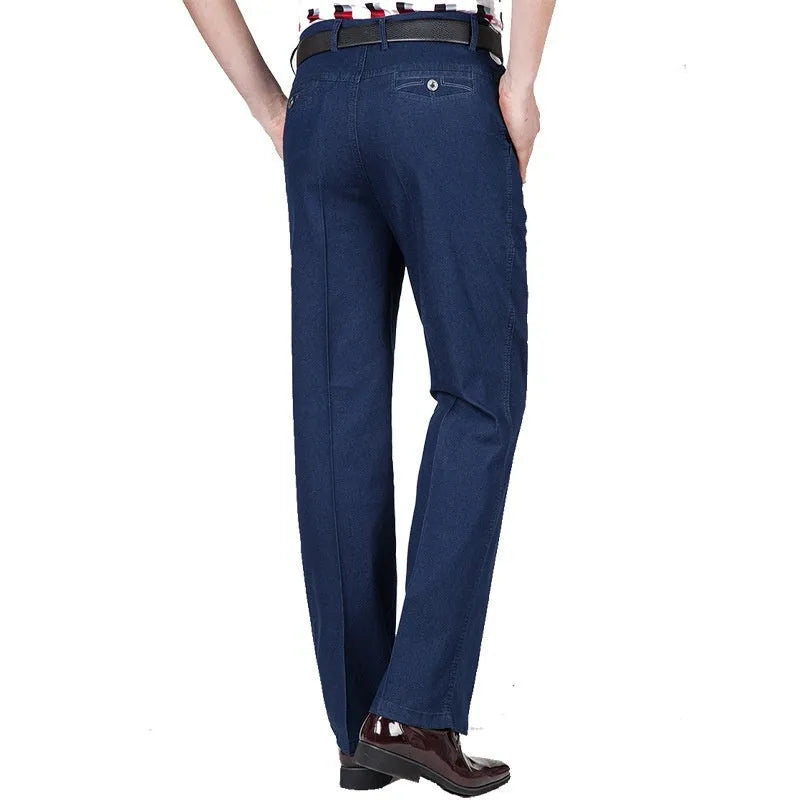 Men's high waist loose fit blue jeans on a hanger showing zip fly and casual style.