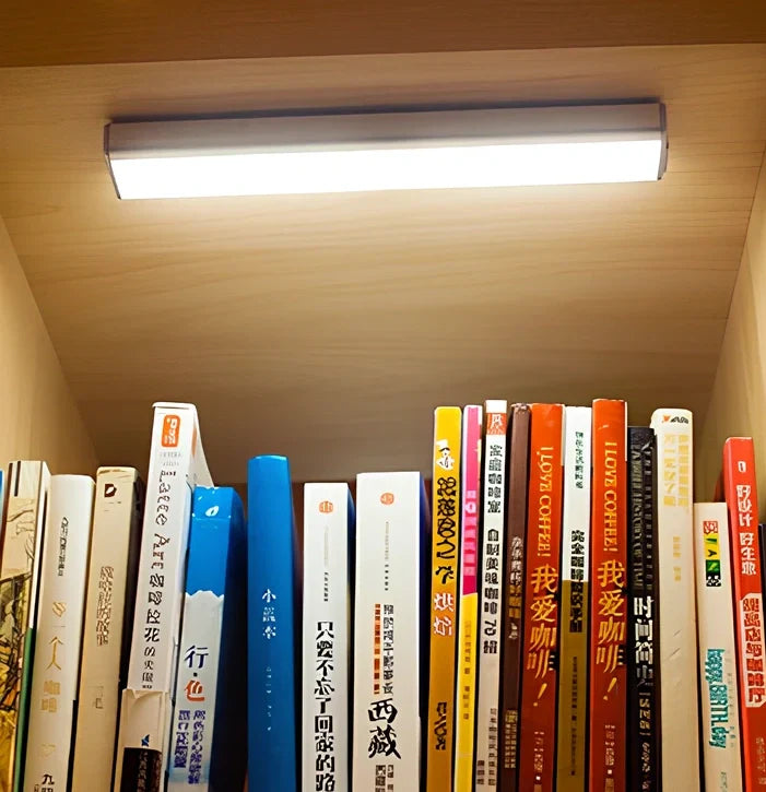 LED body sensor light with wireless charging base and motion detection for cabinet installation