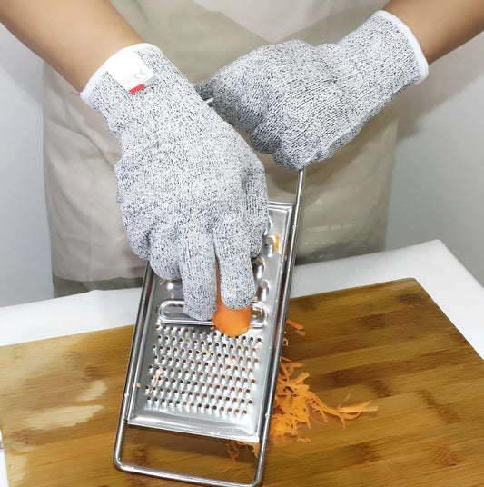 Grey cut-resistant gloves with stainless steel wire construction and adjustable belt closure