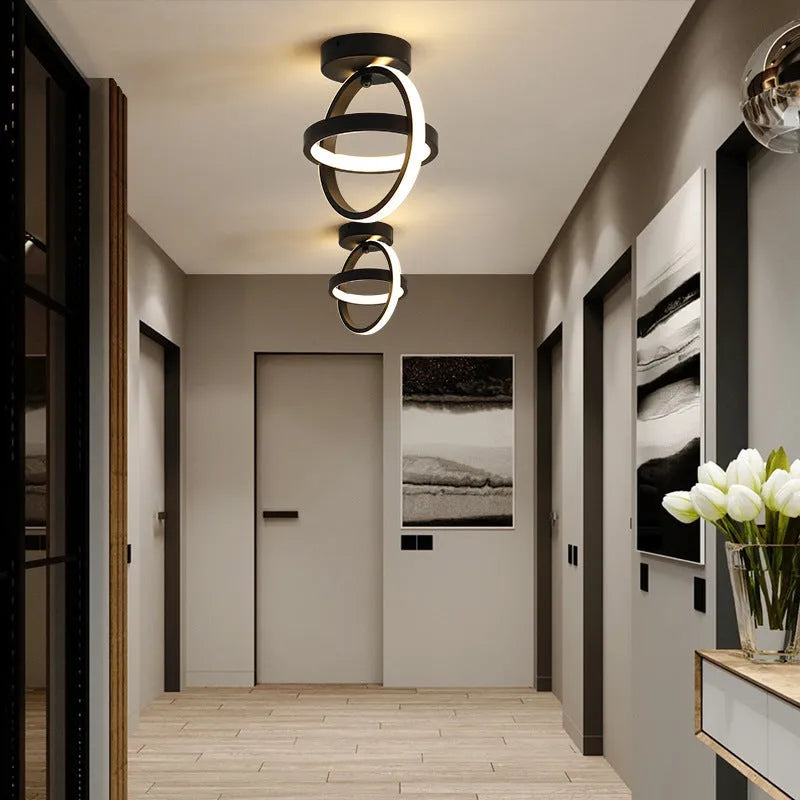 Modern round ceiling light with black metal frame and white acrylic shade, diameter 21cm.