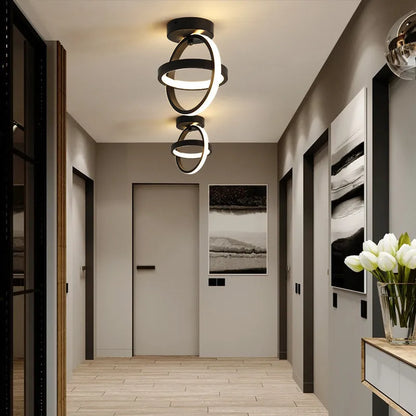 Modern round ceiling light with black metal frame and white acrylic shade, diameter 21cm.