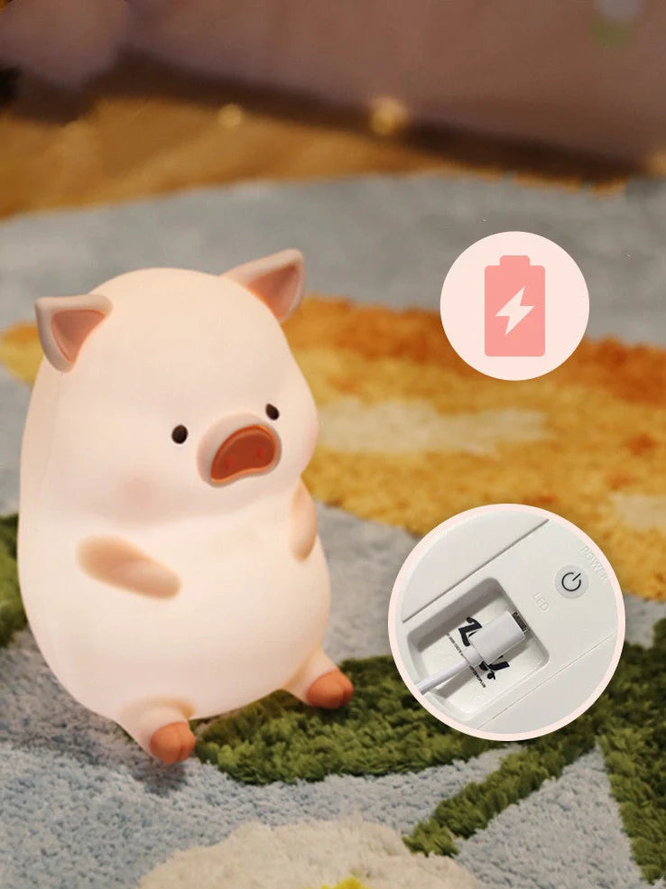 Pink silicone pig night light with USB charging cable, dimensions 180x145x130mm