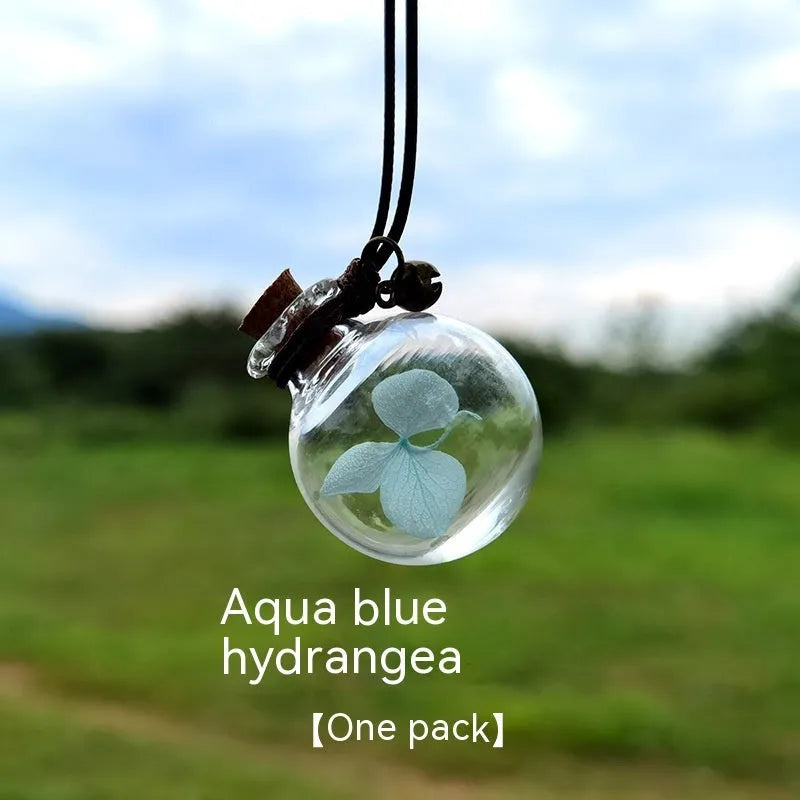 Glass fire extinguisher-shaped car perfume pendant with preserved flowers inside