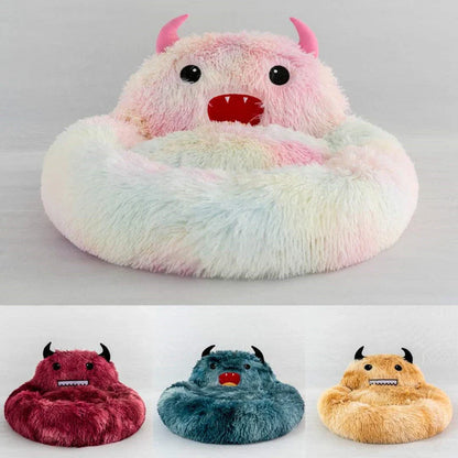 Round plush cat bed with animal embroidery in dark blue, perfect for winter warmth