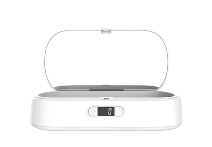 White ABS plastic ultraviolet wireless disinfection box steriliser with phone inside.