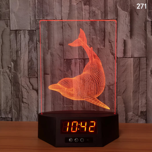 Glowing 3D dolphin LED night light on a table with remote control