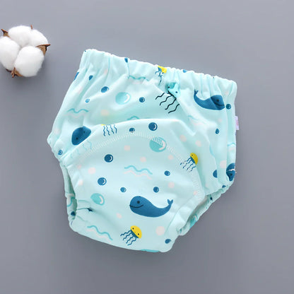 Washable baby training pants with 6-layer gauze construction in assorted patterns including animals and geometric designs