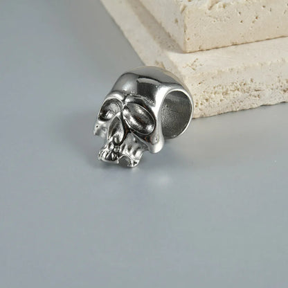 Personalised stainless steel hollow skull Buddha earrings showing 1.5 cm diameter and electroplated colour options