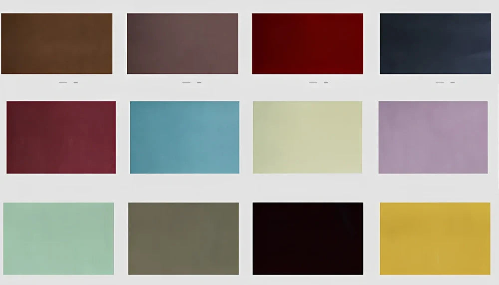 Weighted blanket with quilted compartments containing glass beads, available in dark grey, light grey, and navy colours