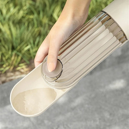 Beige or green foldable dog water bottle with food container, measuring 21.5cm height