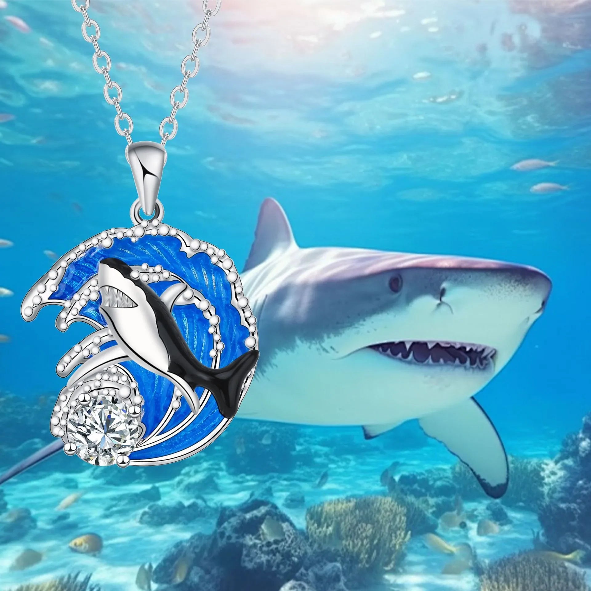 Close-up of a women's shark pendant necklace on a cross chain, showing detailed copper animal modelling.