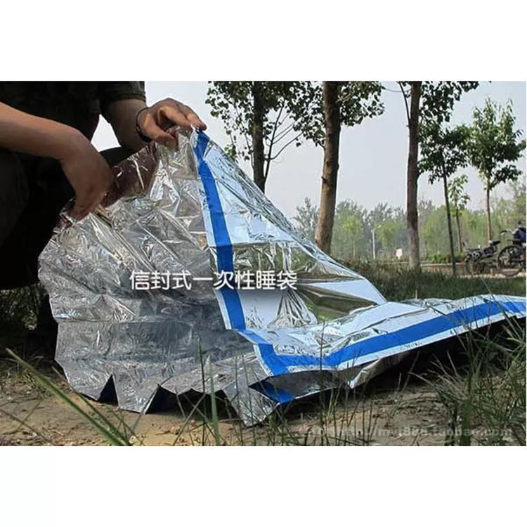Disposable emergency sleeping bag for cold weather camping and hiking