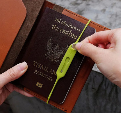 Green gray silicone card holder open showing magnetic closure and visible card slots