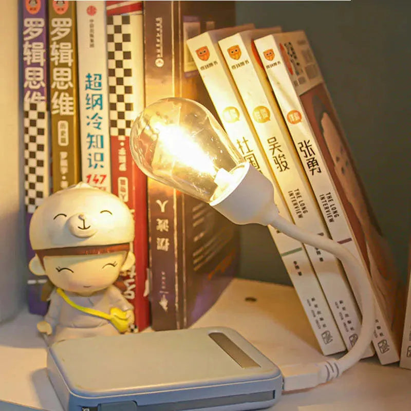 USB rechargeable folding tungsten night light with USB S14 style lamp bulb providing 60 lumen warm white 2700K illumination for bedside, nursery, hallway, and power outage emergency use