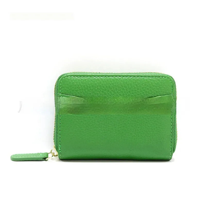 Genuine leather men's and women's zipper coin storage purse in black with sewing line detail.