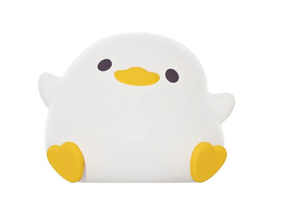 Seagull-shaped silicone night light in blue or yellow measuring 96.5×91×130mm with tap controls