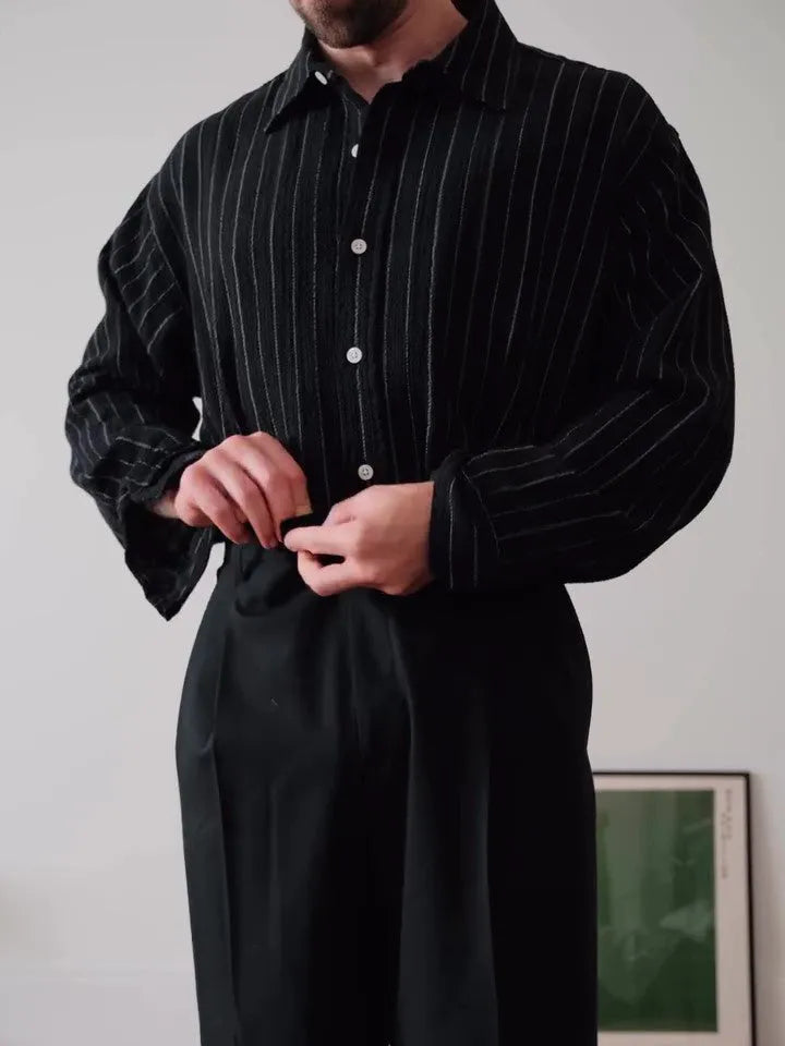 Men's black and white pinstripe long sleeve button down shirt with a regular fit.
