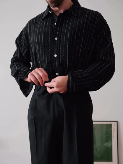 Men's black and white pinstripe long sleeve button down shirt with a regular fit.