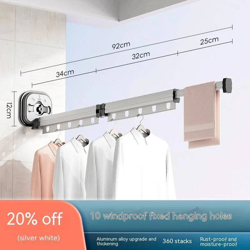 Aluminum retractable drying rack mounted on a window, extending outward for clothes drying