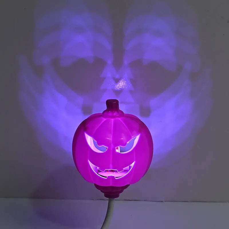 Plastic pumpkin decorative lamp with USB cable, available in purple or yellow light, measuring 22cm tall
