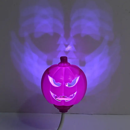 Plastic pumpkin decorative lamp with USB cable, available in purple or yellow light, measuring 22cm tall