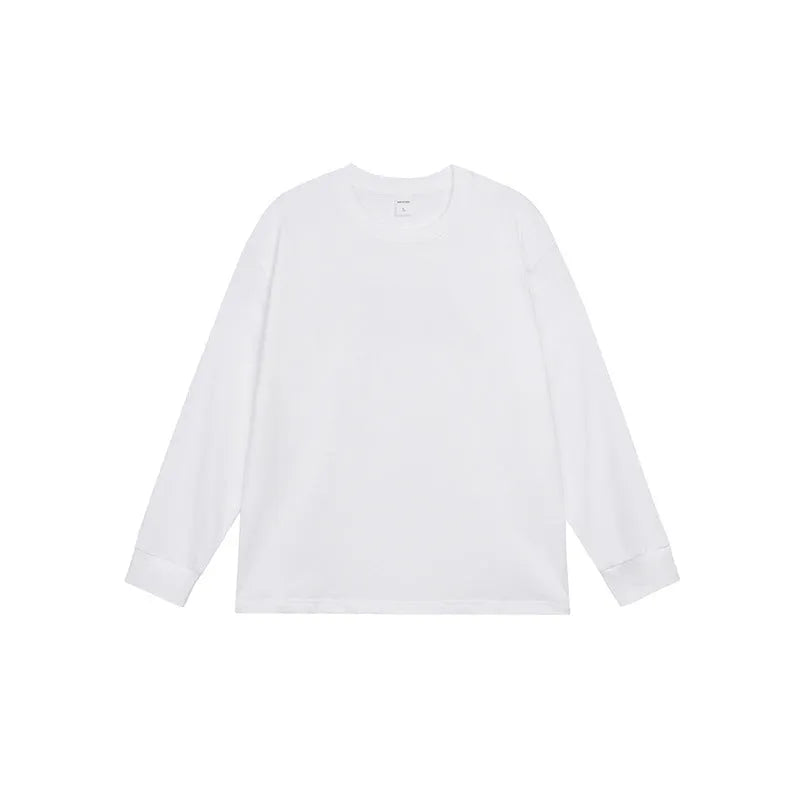 Man wearing a simple solid colour long sleeve cotton t-shirt in a loose, casual fit.