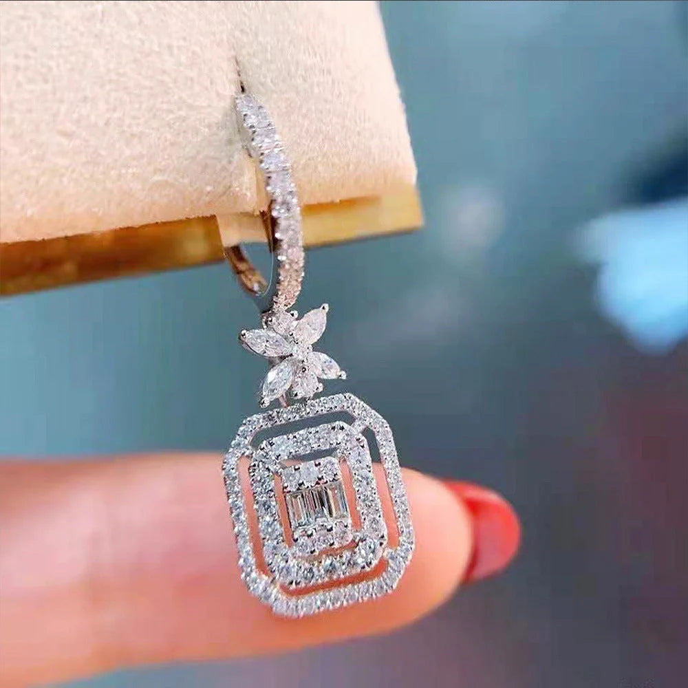 Elegant micro-set zirconia bow earrings for women, perfect for adding sparkle to any outfit.