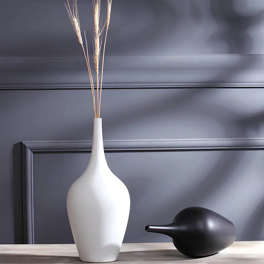 White ceramic tall vase with matte finish measuring 160mm height for flower arrangements