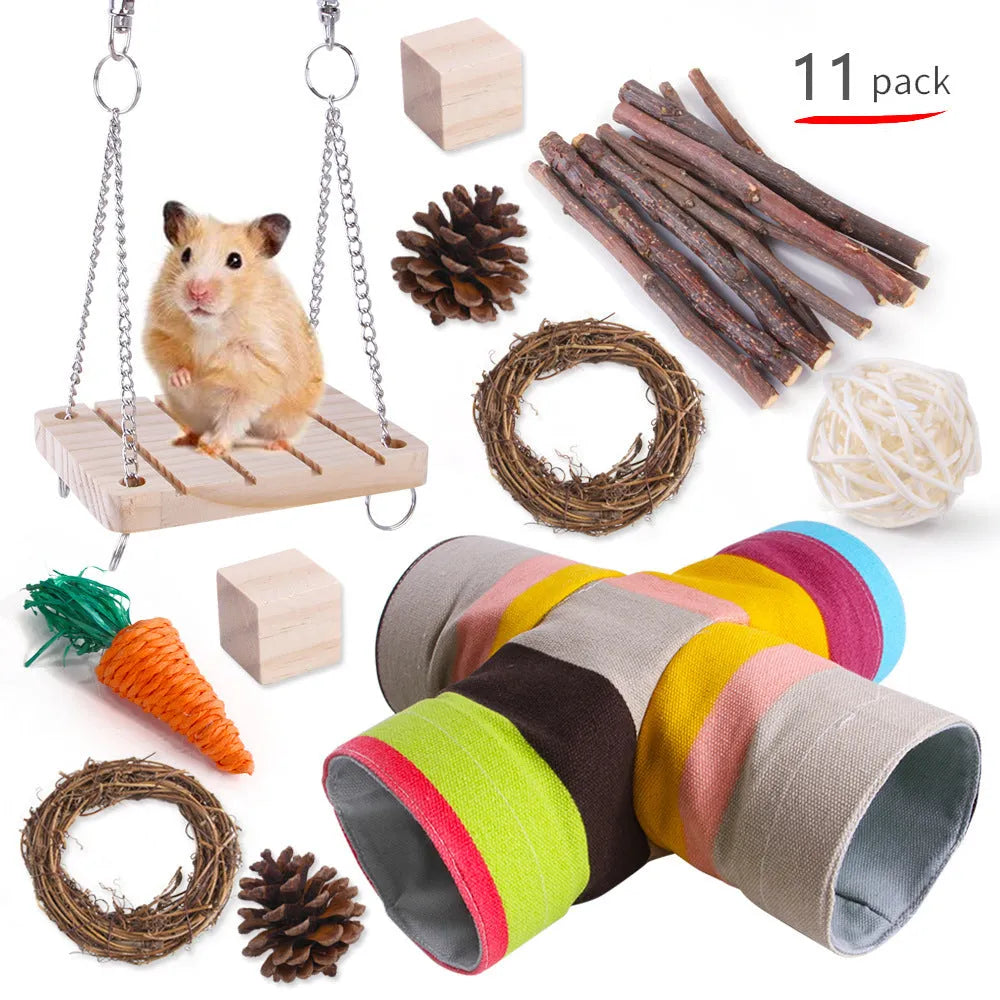 Assortment of wooden and natural fibre chew toys for small pets including balls, rings and woven shapes.