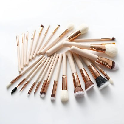 26 pink makeup brushes with wool bristles and wooden handles arranged in a PU zip bag.
