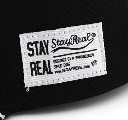 Cotton baseball hat with letter embroidery showing dome crown and adjustable strap in black and white colour options